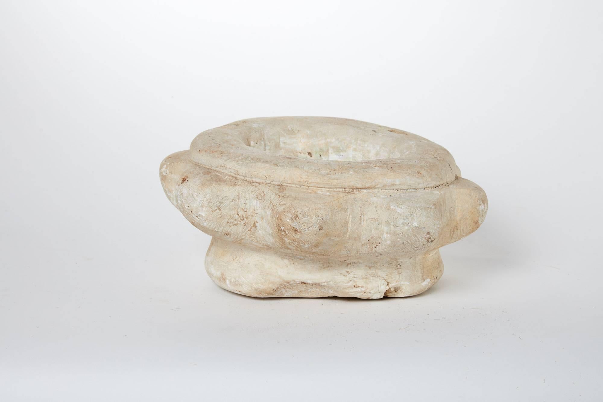 Early 20th century marble vessel pair from Turkey. Its comprised of a larger and smaller floral shaped, hand chiseled stone vessels. 

Small: 9.25 diameter x 4 height
Large: 10.75 diameter x 4.5 height.