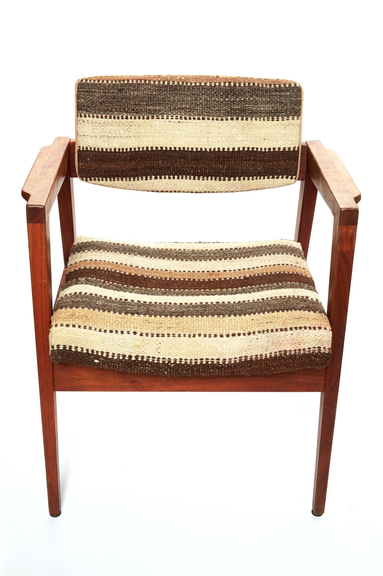 Pair of mid-20th century  Danish armchairs. 
Covered in vintage African Berber rug. 
Structure is very stabile and chairs have been restored and reupholstered.
