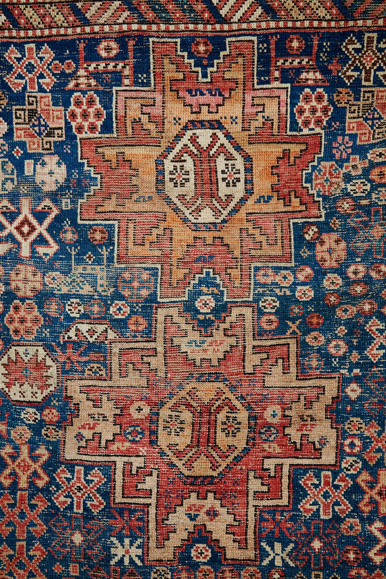 Early 20th century Caucasian Lesghi star rug 
Typical Caucasian design on this rug from the Caucasian mountain area 
The mountains are the border between Europe and Asia.
