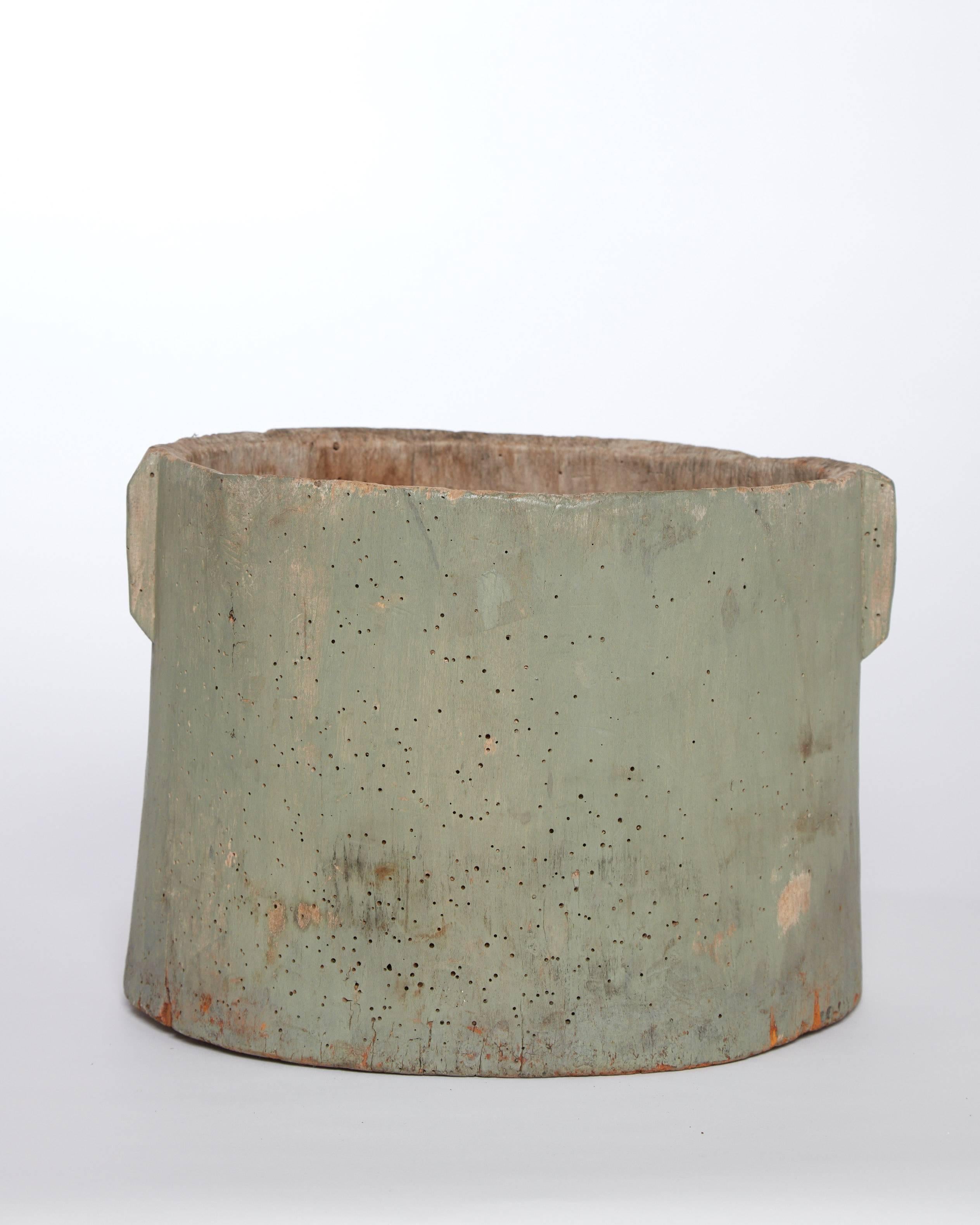 Early 20th century American stamped 'MS' wooden vessel with two handles 
Milk painted a soft green color.
 