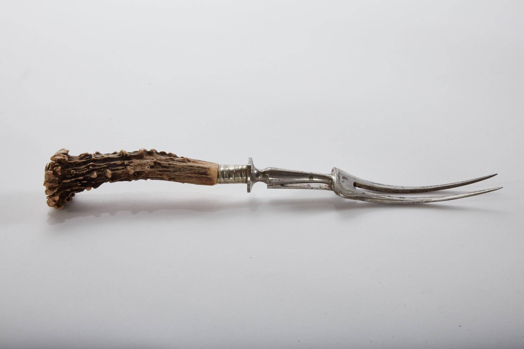 Carving antler serving fork from Bavarian hunting lodge,
18th century.