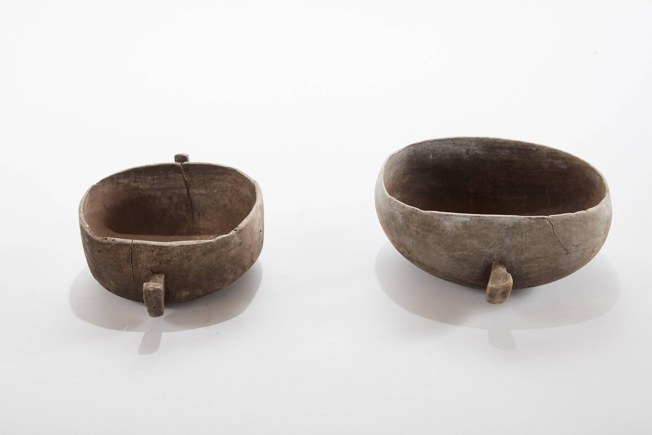 20th century East African grain bowls with handles pair (two pieces in set).

From left to right
A) 10.5