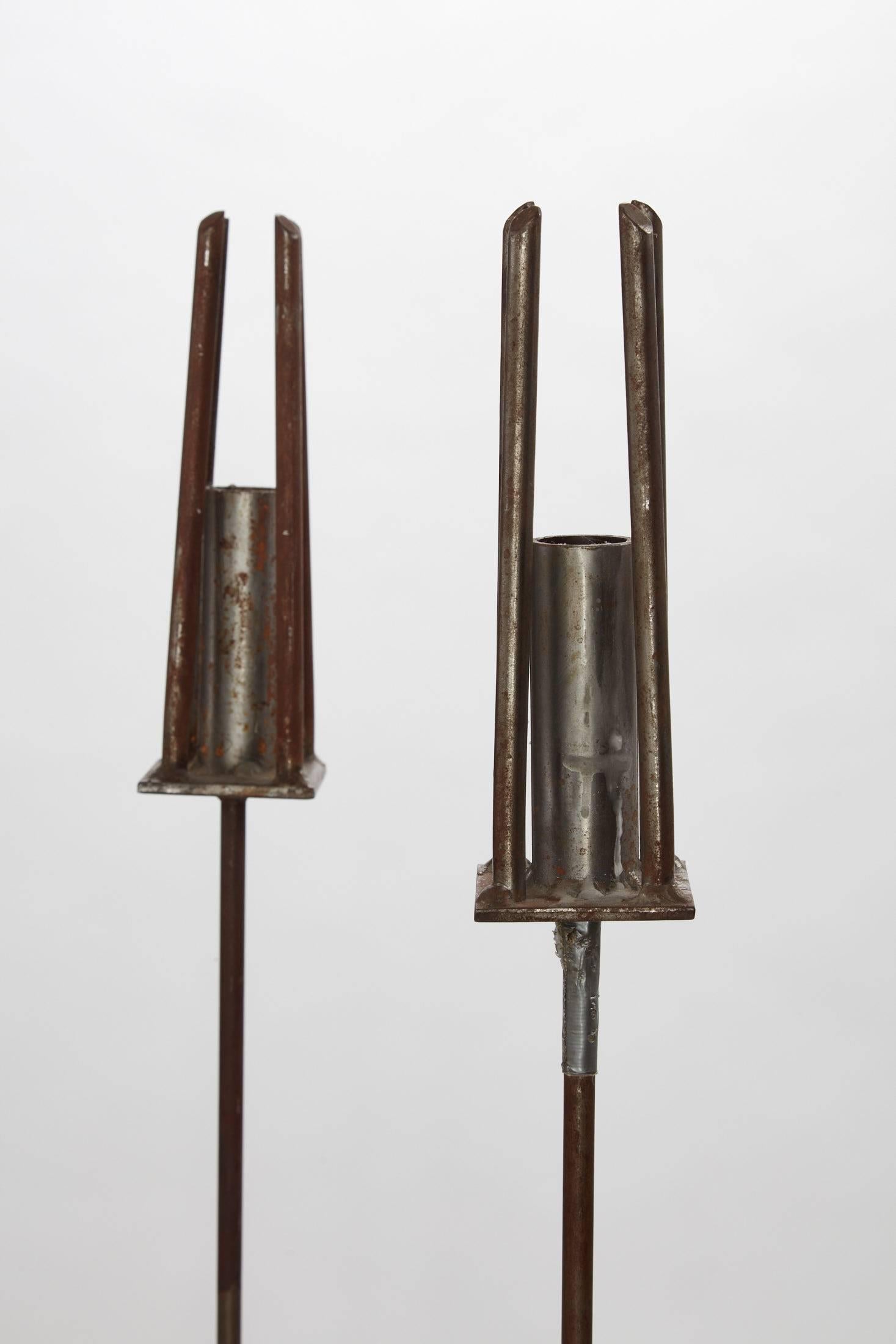20th century pair of tall/floor iron candlesticks



Measures: Candlesticks are 52