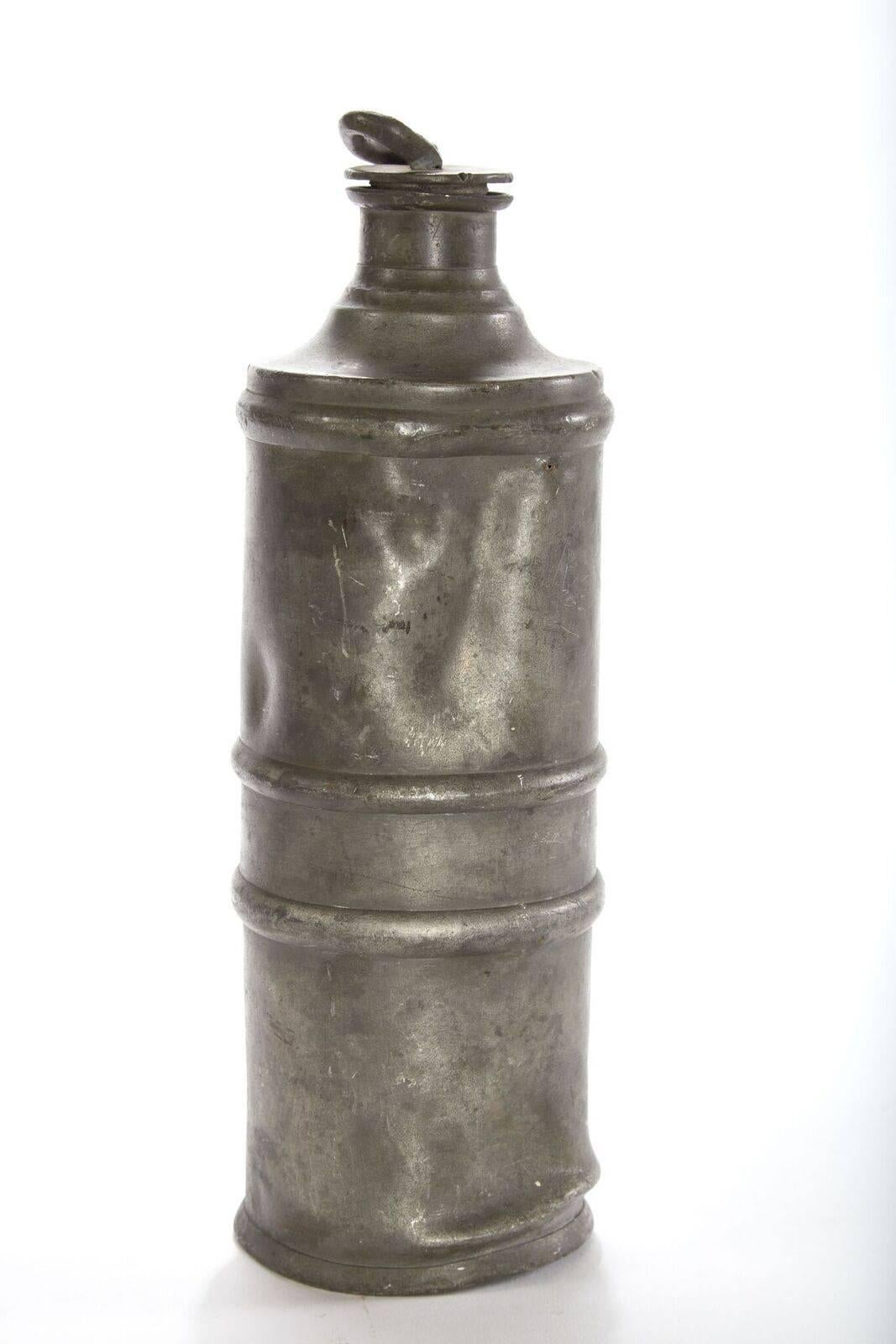 19th century pewter canister from Germany
Measure: 12.5 in height x 4 in diameter.