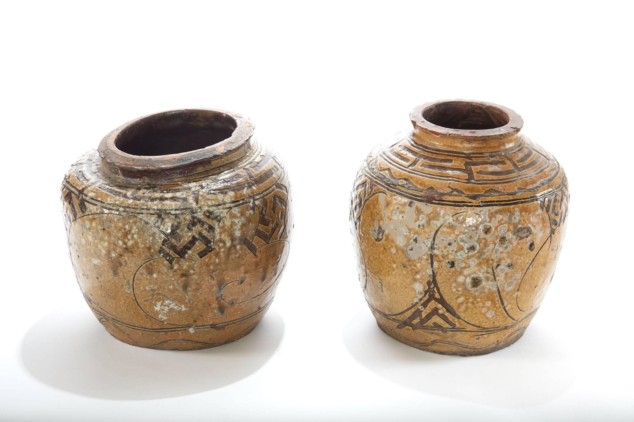 American Two of a Pair of 19th Century Glazed Asian Pots