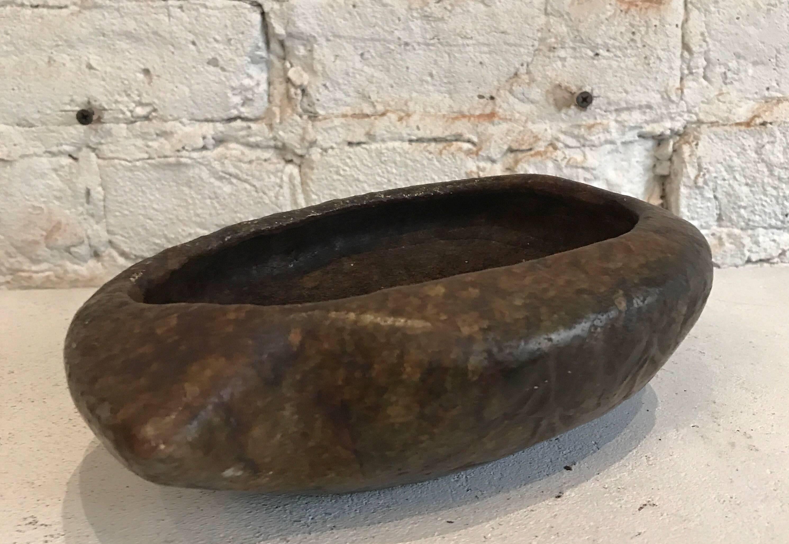 Early 20th century hand-carved Brazilian soap stone bowl 
most likely used as a cooking vessel 


Dimensions: 8 in. W x 5 in. D x 2.75 in. H
opening is 6 in. W x 3.5 in. D.
