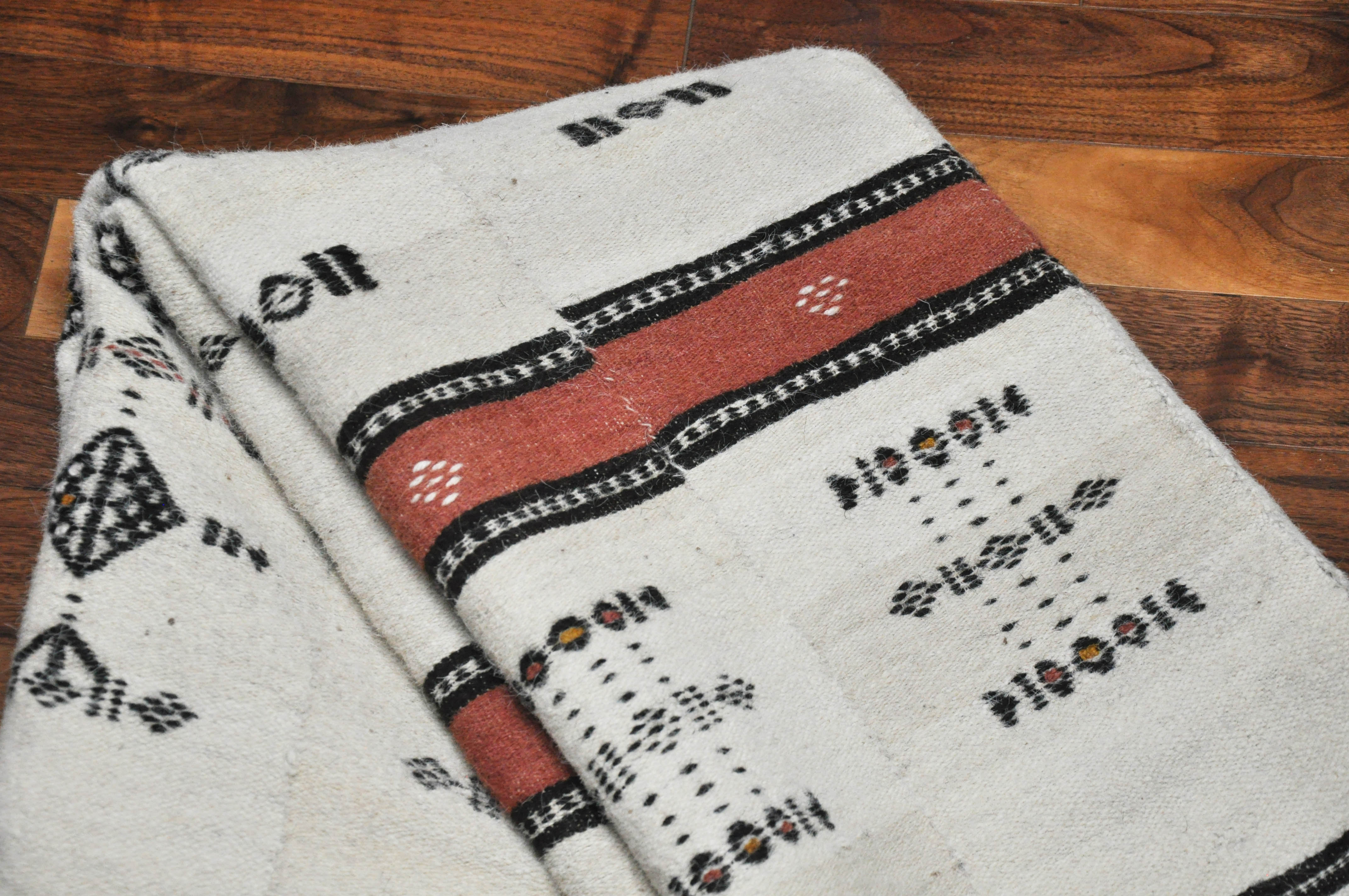 North African 20th Century White, Black and Faded Red African Textile
