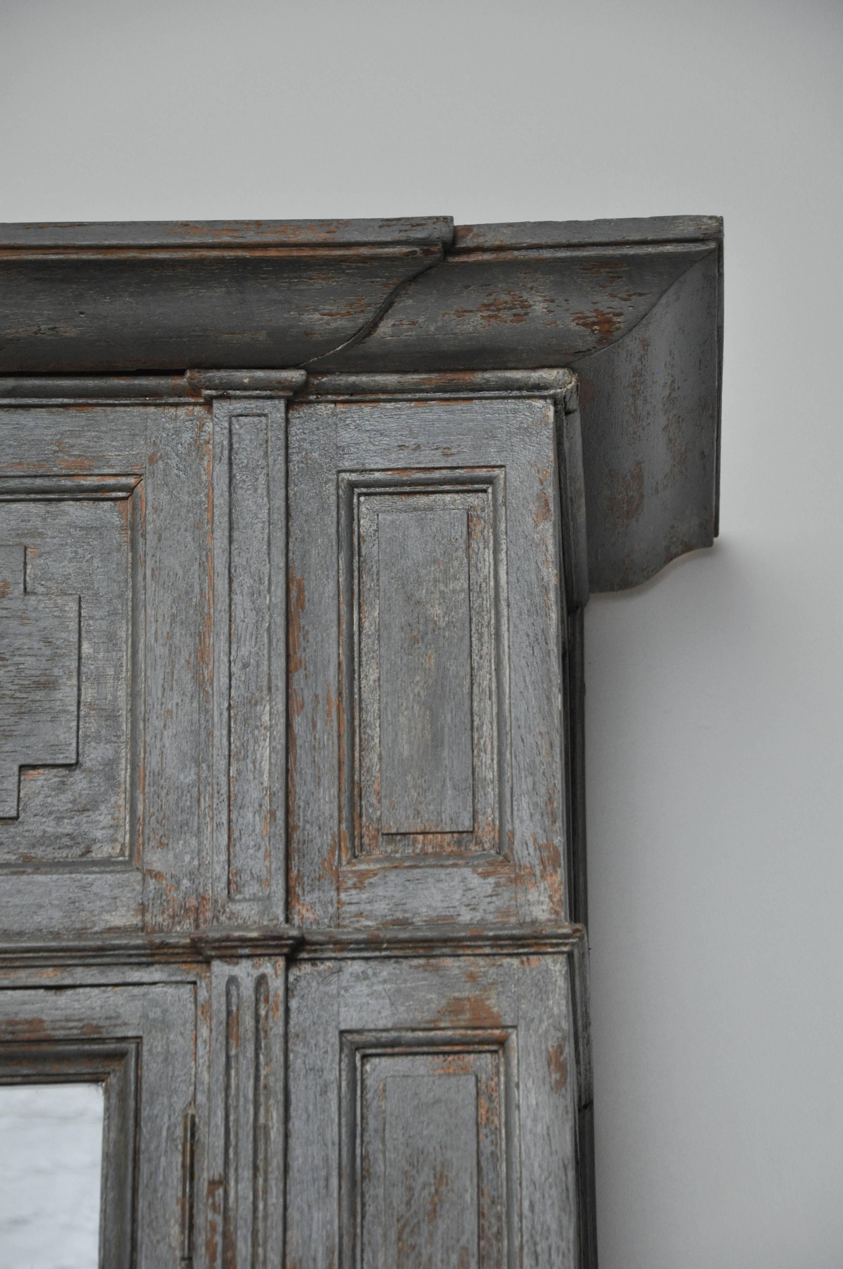 Early 19th Century Extra Tall French Painted Gray CabinetFound in the South of France. 
This piece has significant presence given the height although, not terribly wide or deep, allowing this to fit into a narrow hall, smaller bedroom or any living