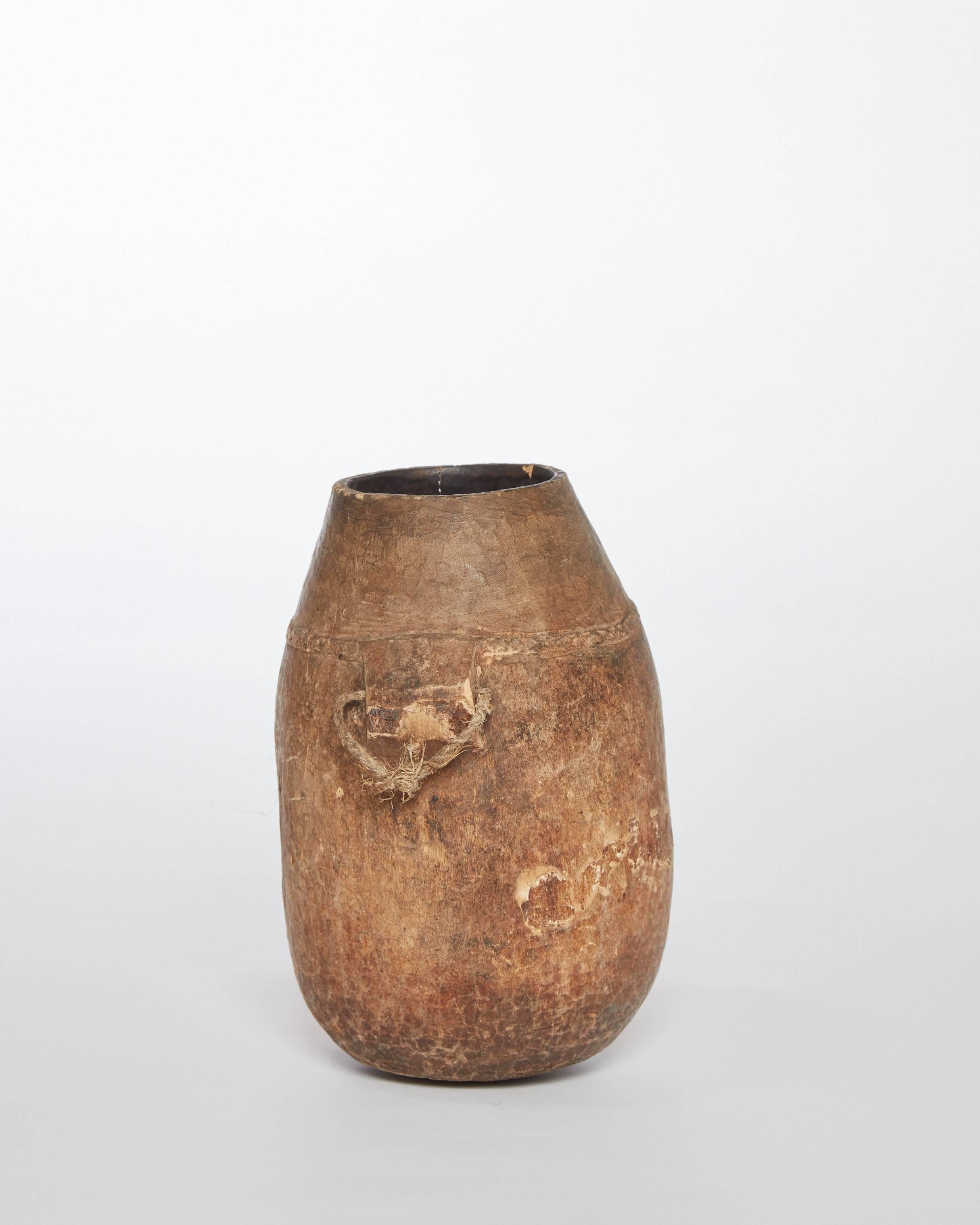 20th century African wooden milk jug
Has character!
 