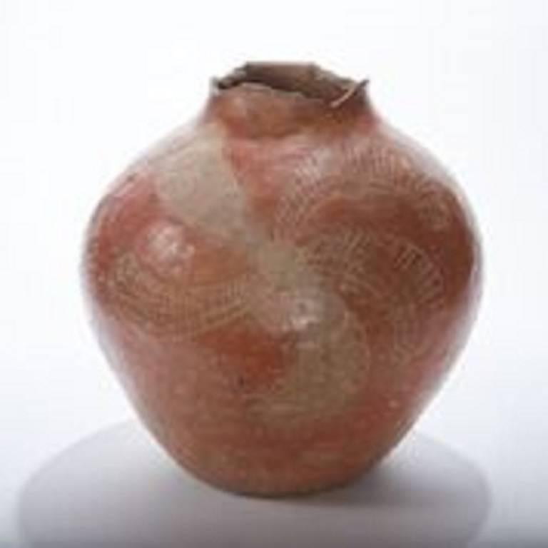 19th century painted clay country pot from Brazil
Beautiful example of pottery from the countryside
Worn rim adds to the beauty of this piece as does the muted soft rusty / terracotta shading.
   