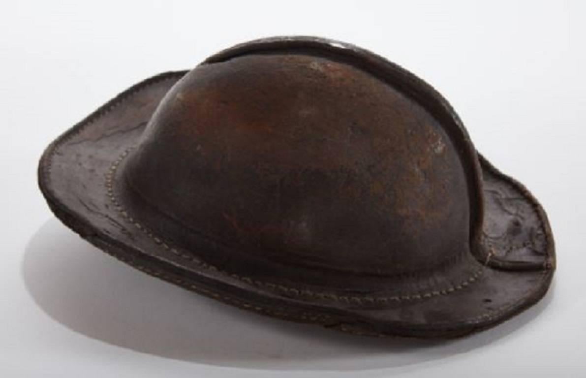 Early 19th century Italian leather military cap
Unique object with worn, yet sturdy, wonderful patina.