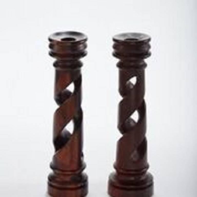 20th century pair of Classic twisted wood candlesticks.
 