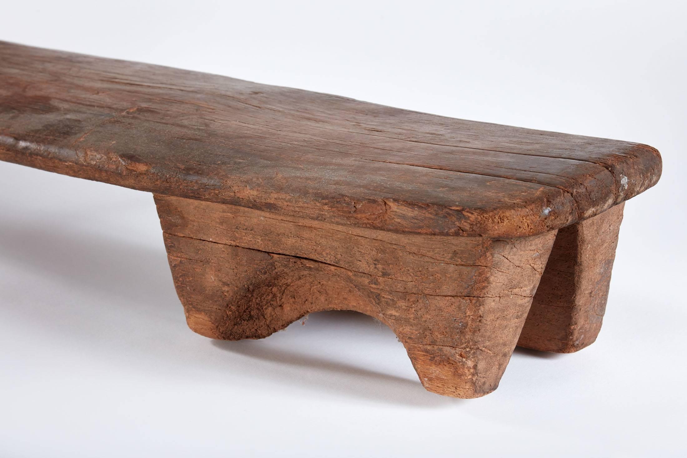 Early 20th century narrow wooden bench /stool from Cameroon.
