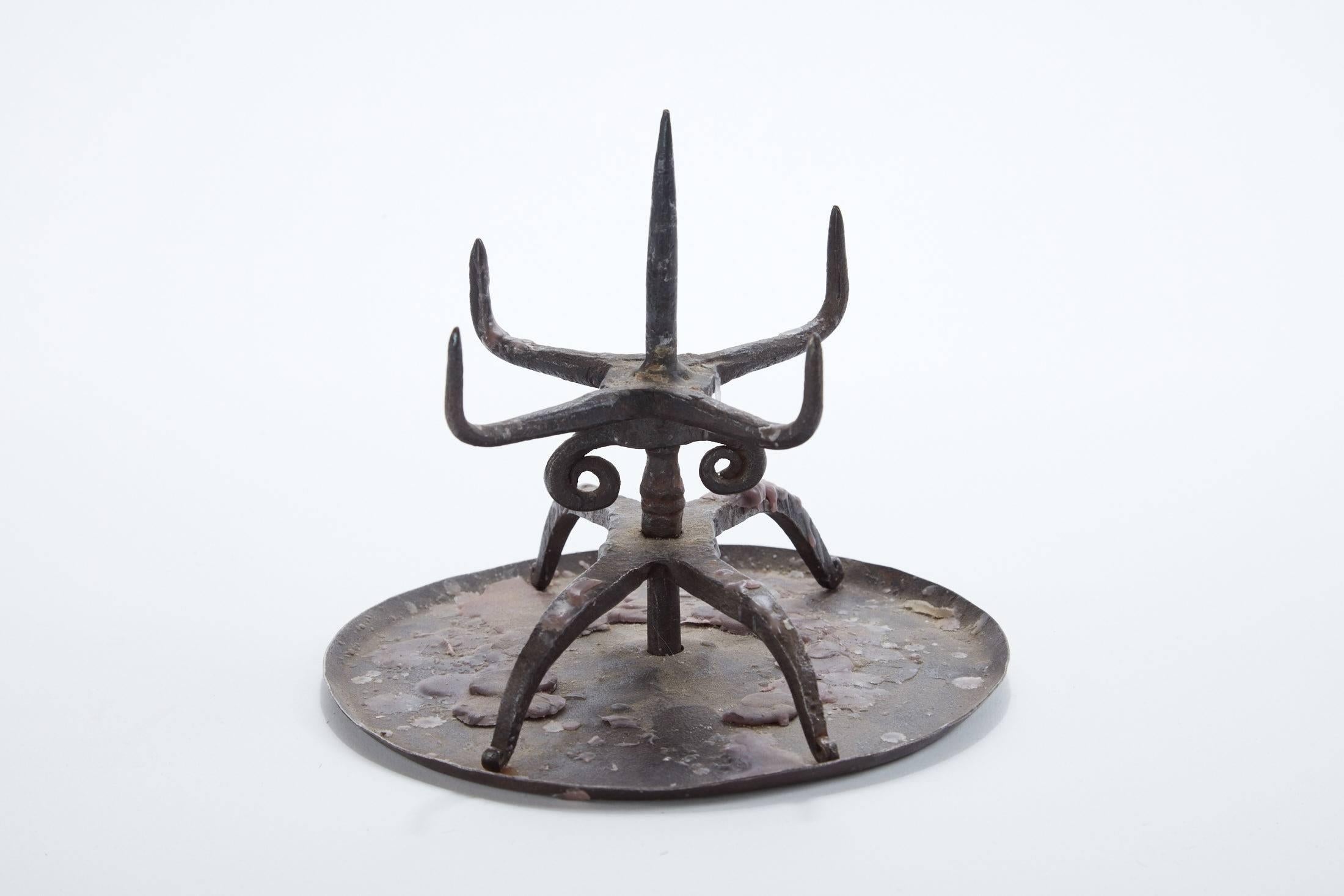 17th century German hand-forged iron candlestick.
   