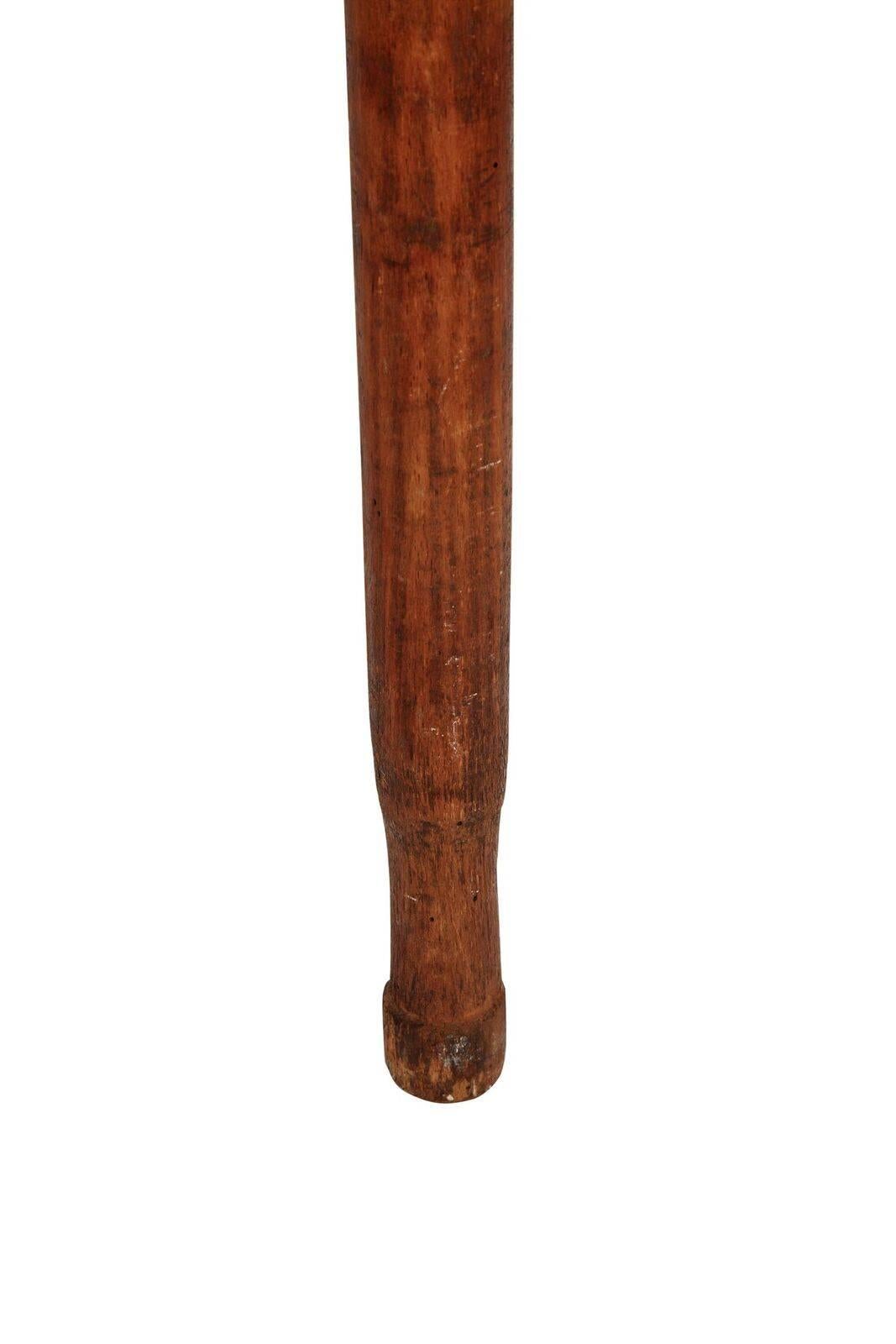 20th century very large wall-mounted African pestle
Measures: 60 inch length x 4.5 inch diameter.