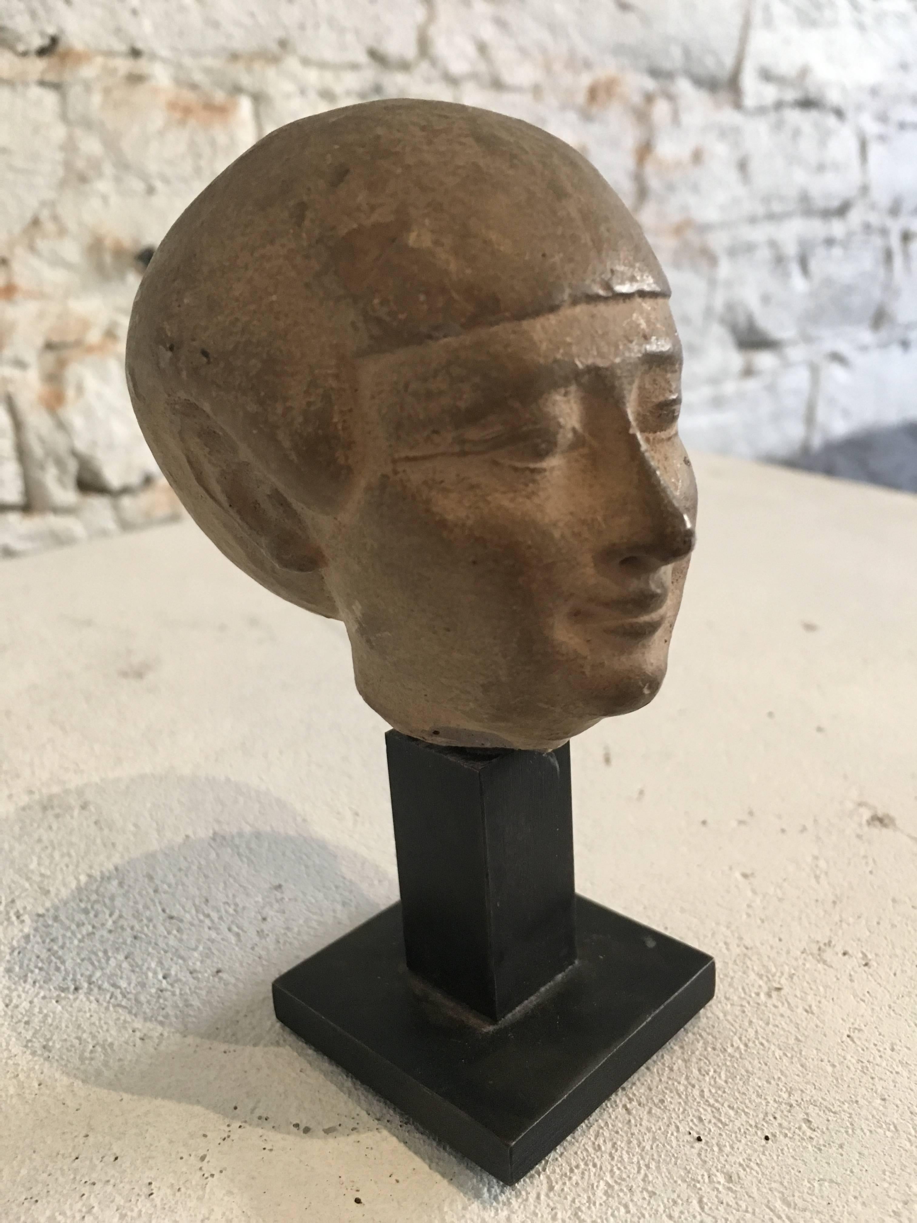 Ancient mounted stone head found in England
This object was found in England with little information regarding its age (probably 19th century), province (Looks Egyptian) and appears to be a fragment of a larger figure
It has been mounted as a