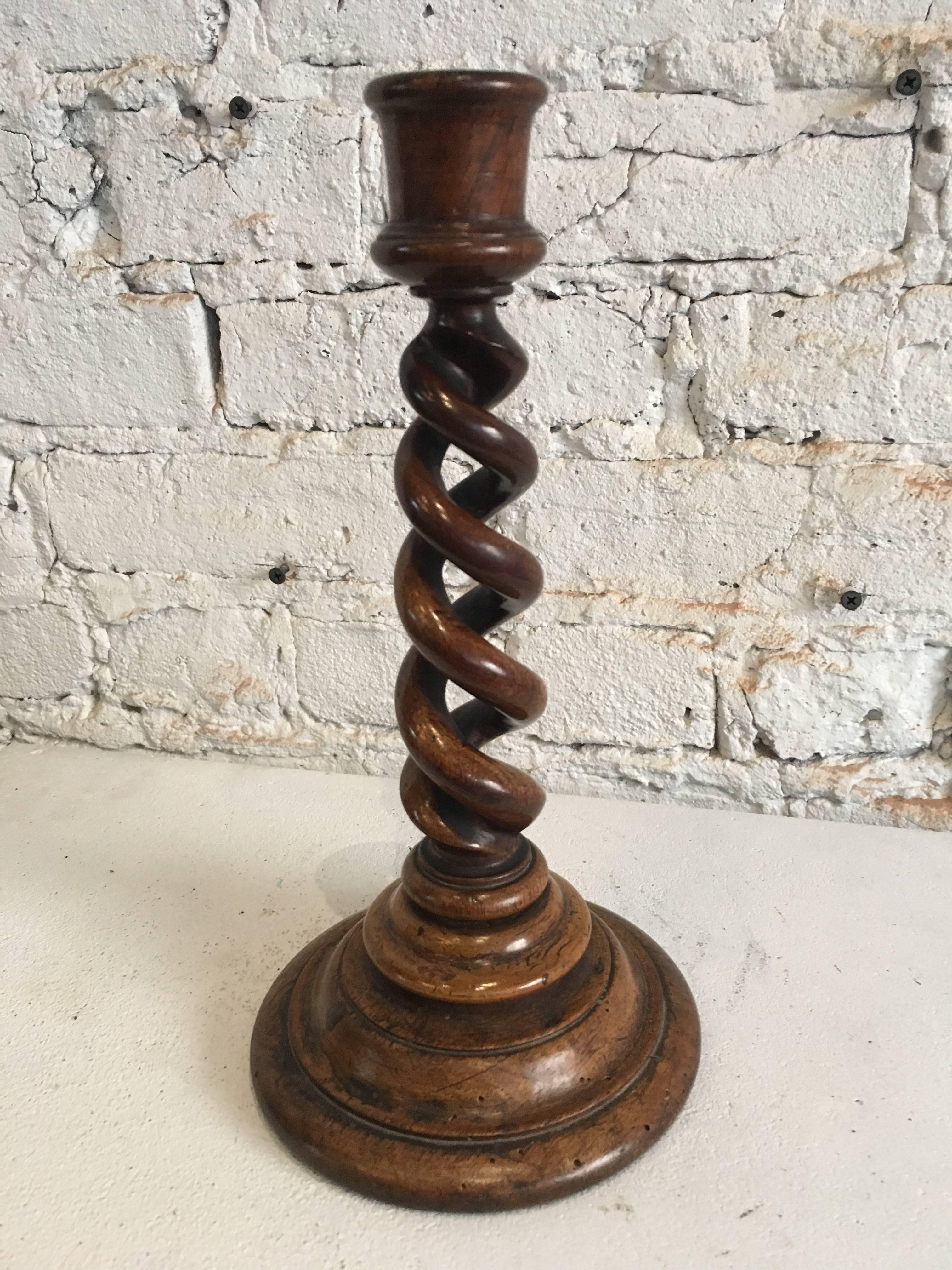 19th century classic French twisted barley wooden candlestick 
Please note hole seen in picture #7

Measures: 10.25 height x 5 inch diameter (base) x 1.5 inch diameter (top).