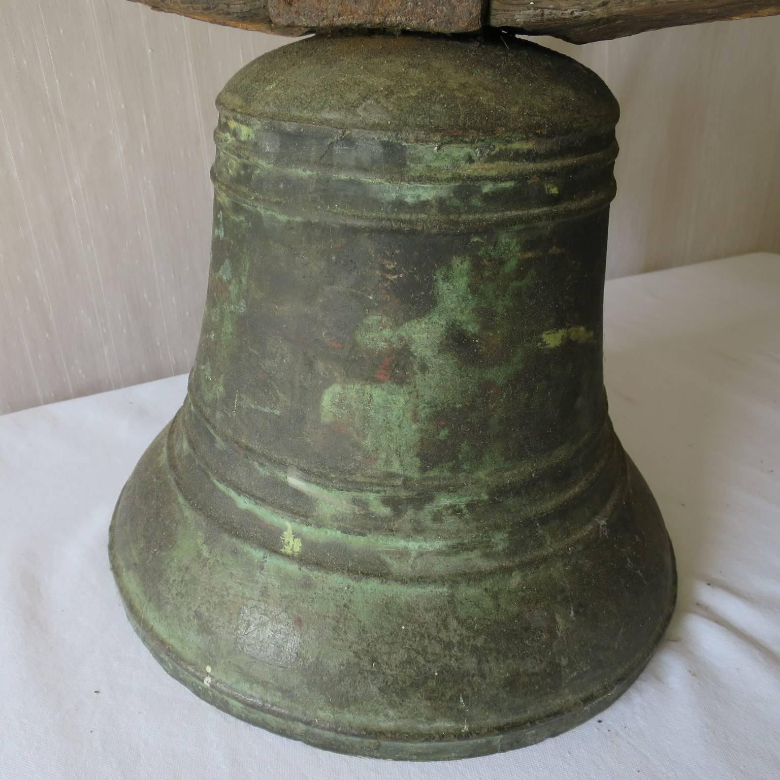 Cast Property Bronze Airin Bell Dated 1815 with its Wrought Iron Top and Wood Beam For Sale