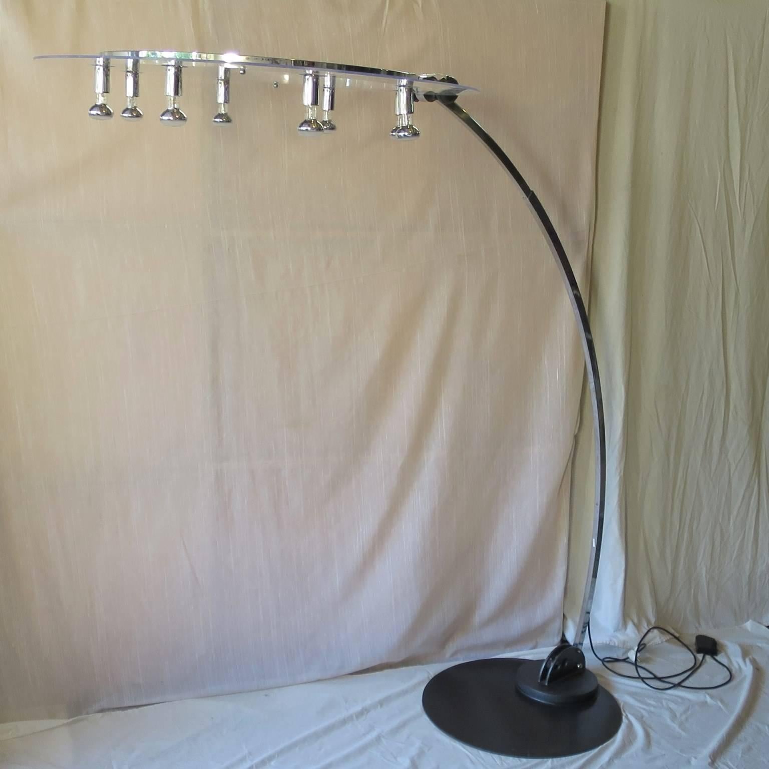 Chrome and Lucite elegant curved design floor lamp .
Eight bulbs around the top Lucite circle, very good lightening .
Wired for USA.
Iron base diameter 24