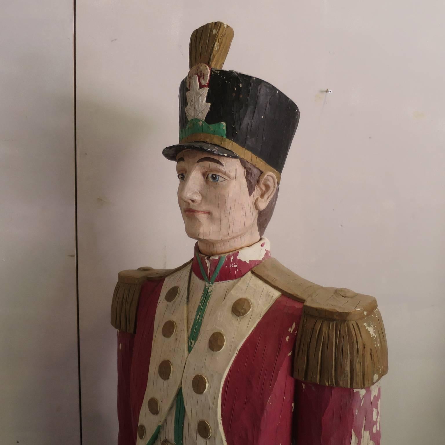 Unusual sculpture imitation wood carving work, representing two military guards wearing a very elegant uniform.
The faces are pleasant, the design and the colors of the uniforms are very interesting.
The restauration could be more detailed, but the