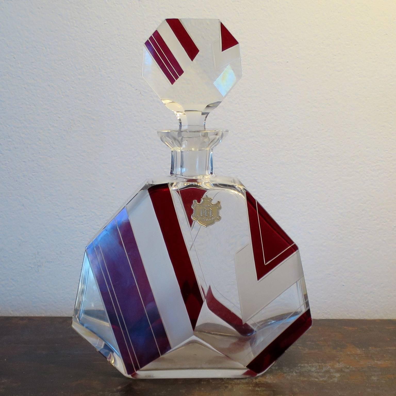 Exquisit Liquor Art Deco set in Bohemian crystal glass.
A tag on the bottle shows the name of the glass factory 