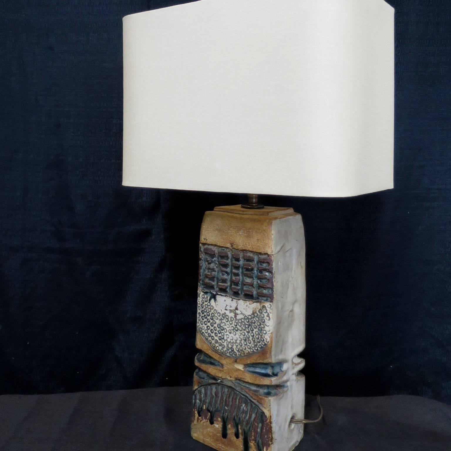 Mid-Century Modernist unique piece, in sandstone, this table lamp is rewired for USA.
 