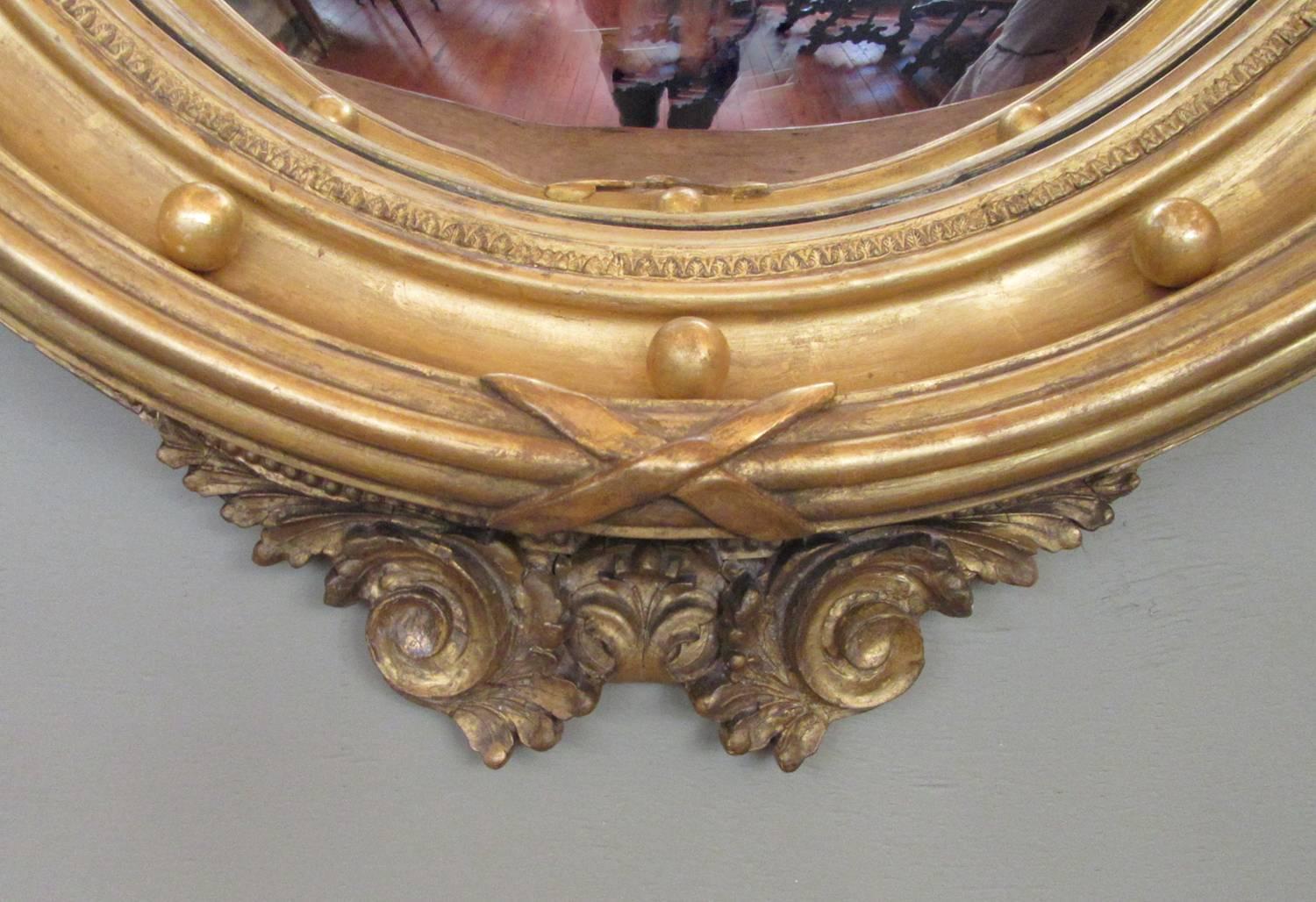 Early 19th Century English Regency Giltwood Convex Mirror with Eagle and Tassle 1