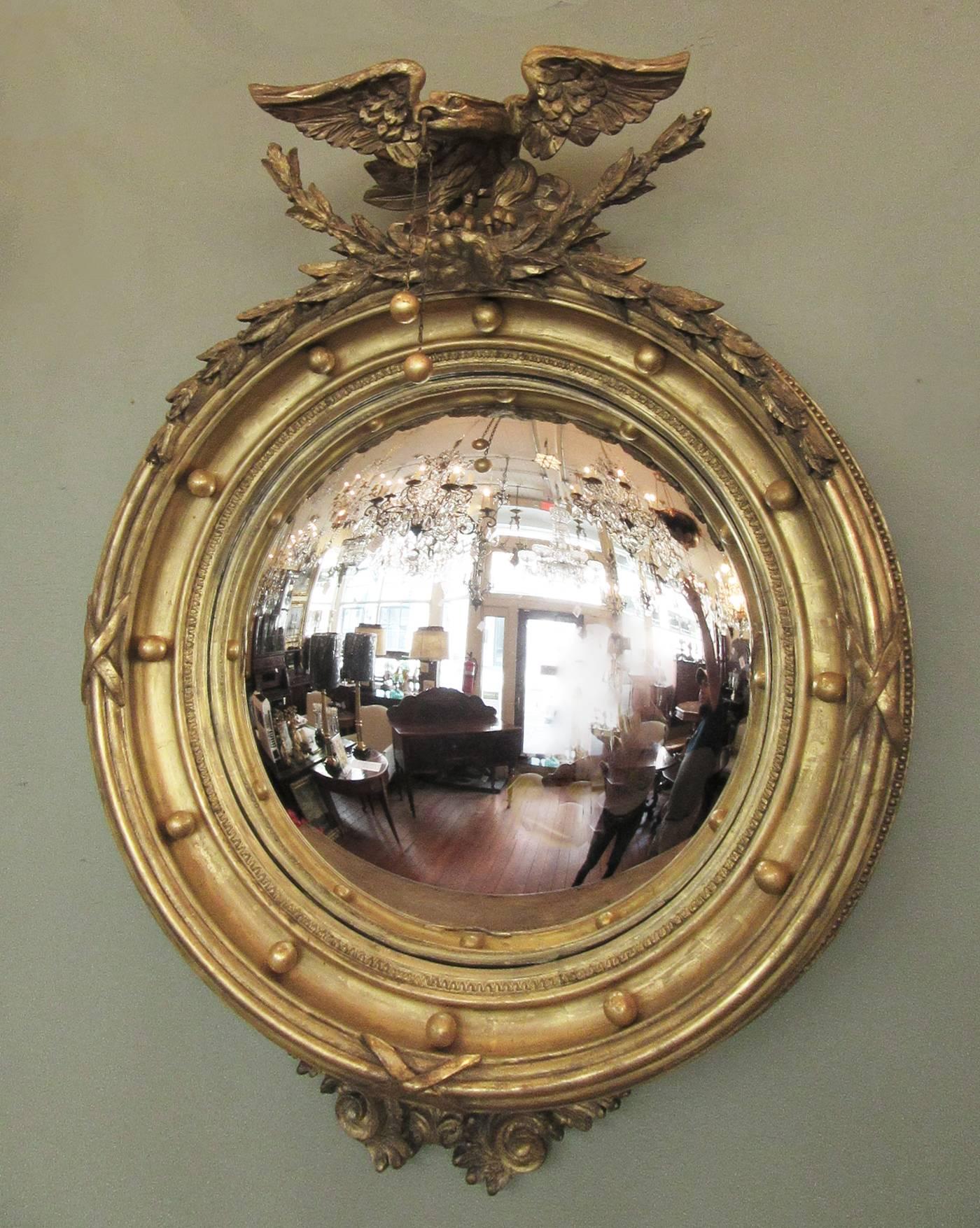 Early 19th Century English Regency Giltwood Convex Mirror with Eagle and Tassle 2