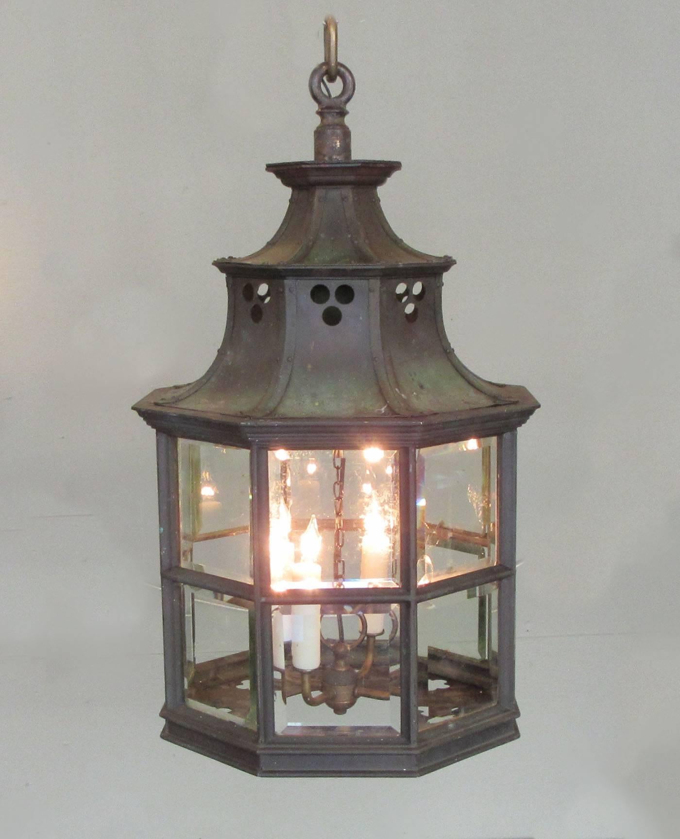 A sizable English Regency bronze and glass lantern, circa 1820, with original glass, trefoil stamped bottom and newly wired with four candle light pendant.
