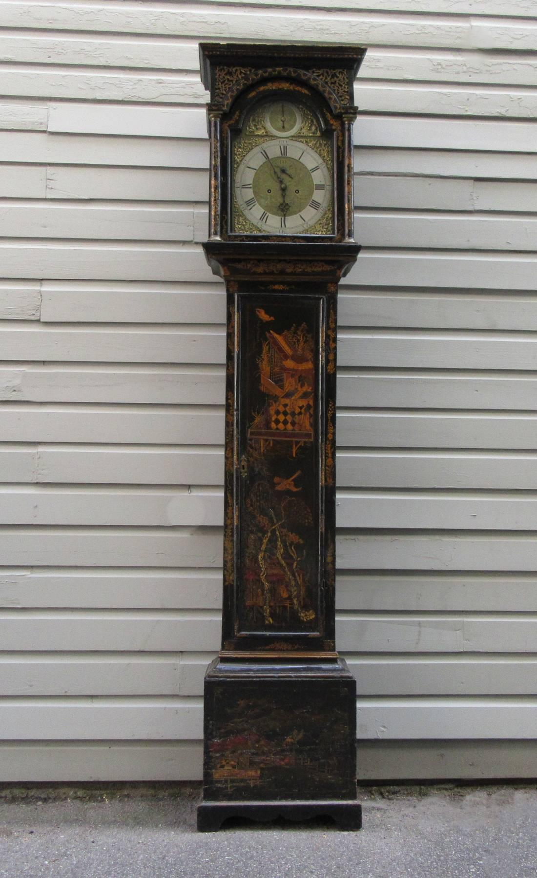 A 18th century English Queen Anne chinoiserie tall case clock, circa 1760, signed by Edward Appleford of Dunftable, an English brazier of the period. The clock keeps consistent time and chimes on the hour.