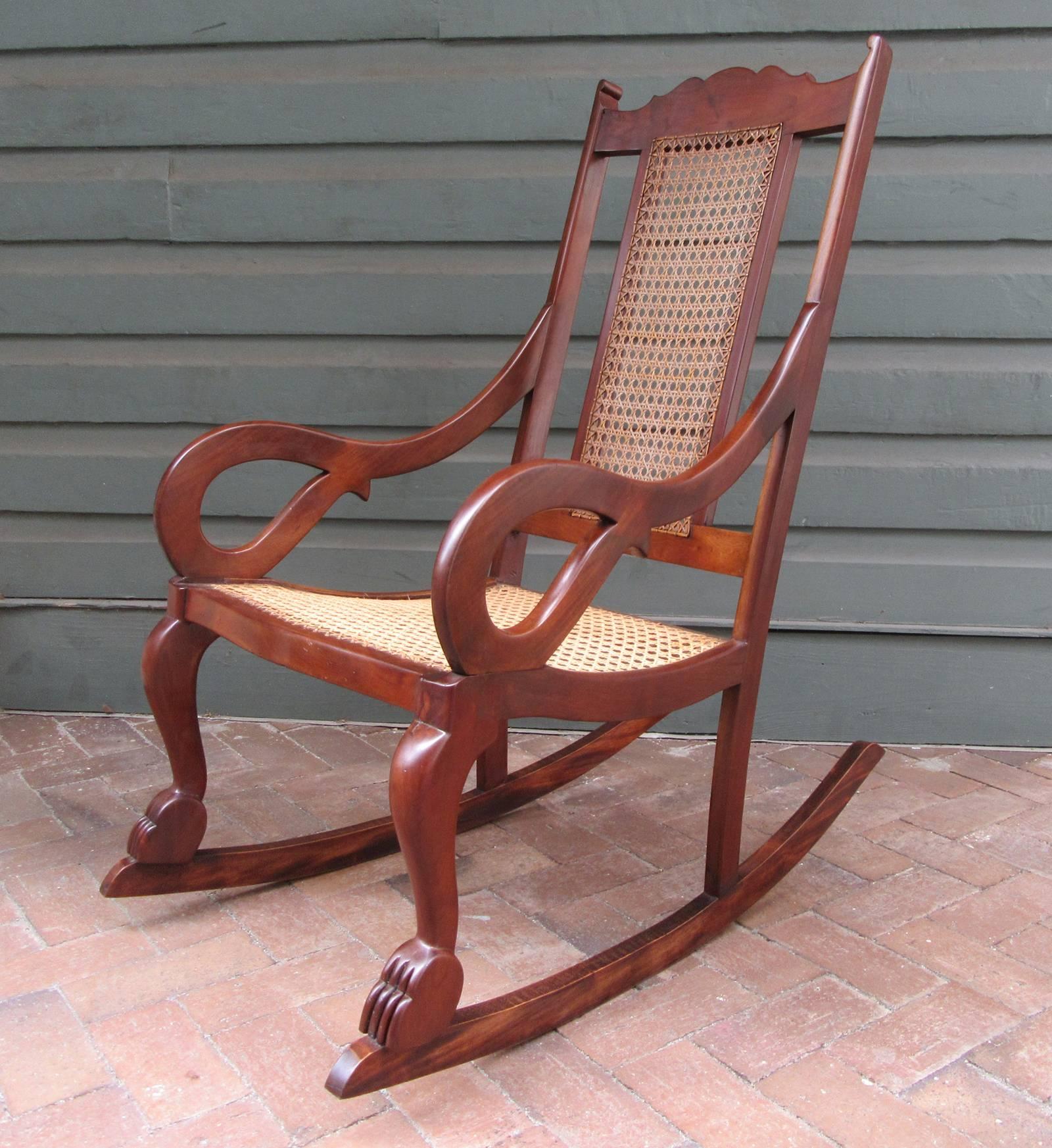 Hand-Carved Early 19th Century Caribbean Regency Mahogany and Cane Rocking Chair For Sale