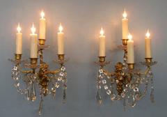 Pair of Early 19th Century French Regence Crystal and Bronze Dore Sconces