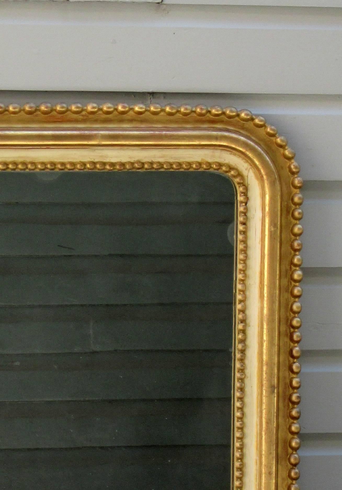 European Mid-19th Century French Louis Philippe Giltwood Mirror with Balls