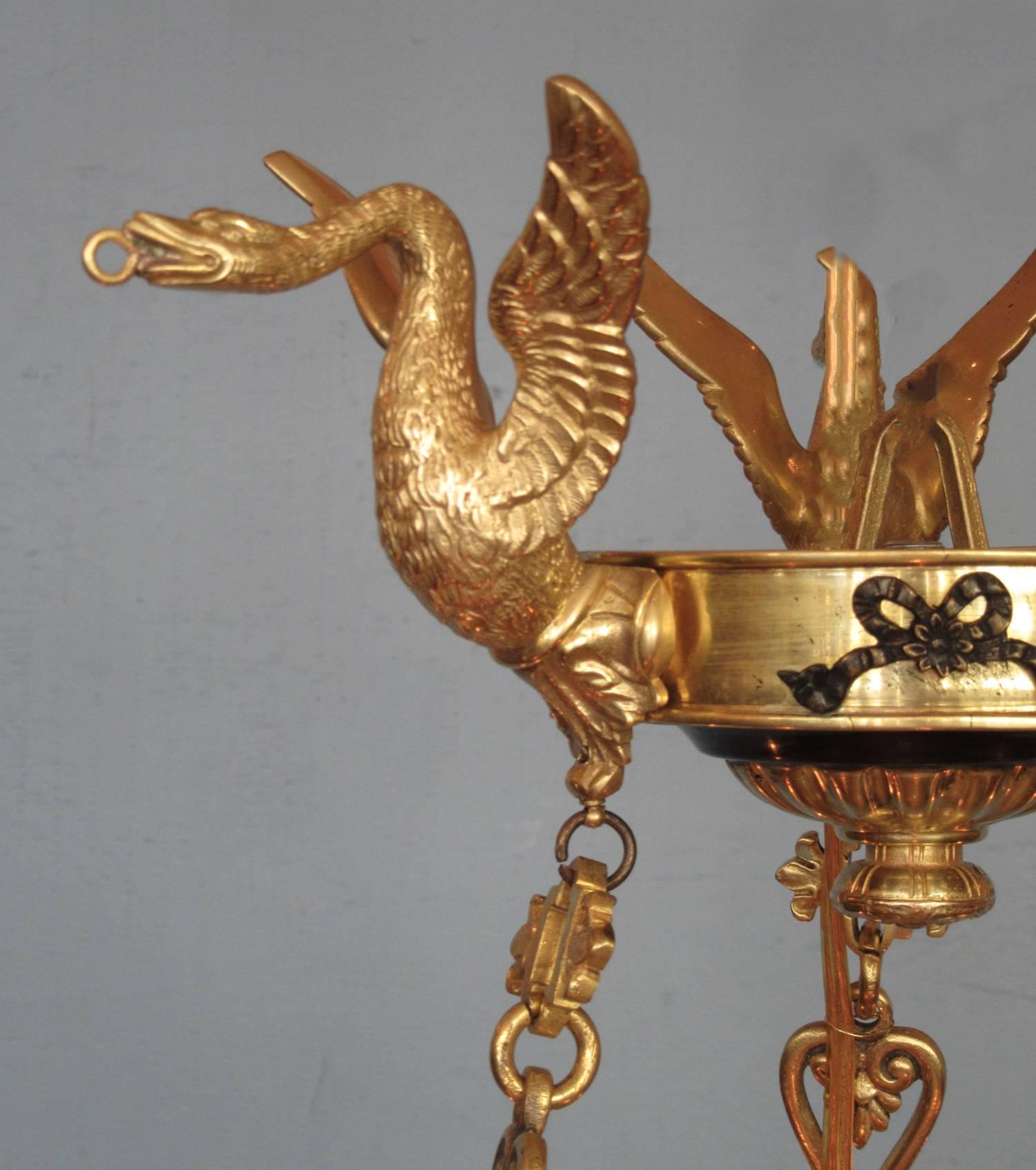 Gilt Early 19th Century French Restoration Patinated and Bronze Dore Swan Chandelier