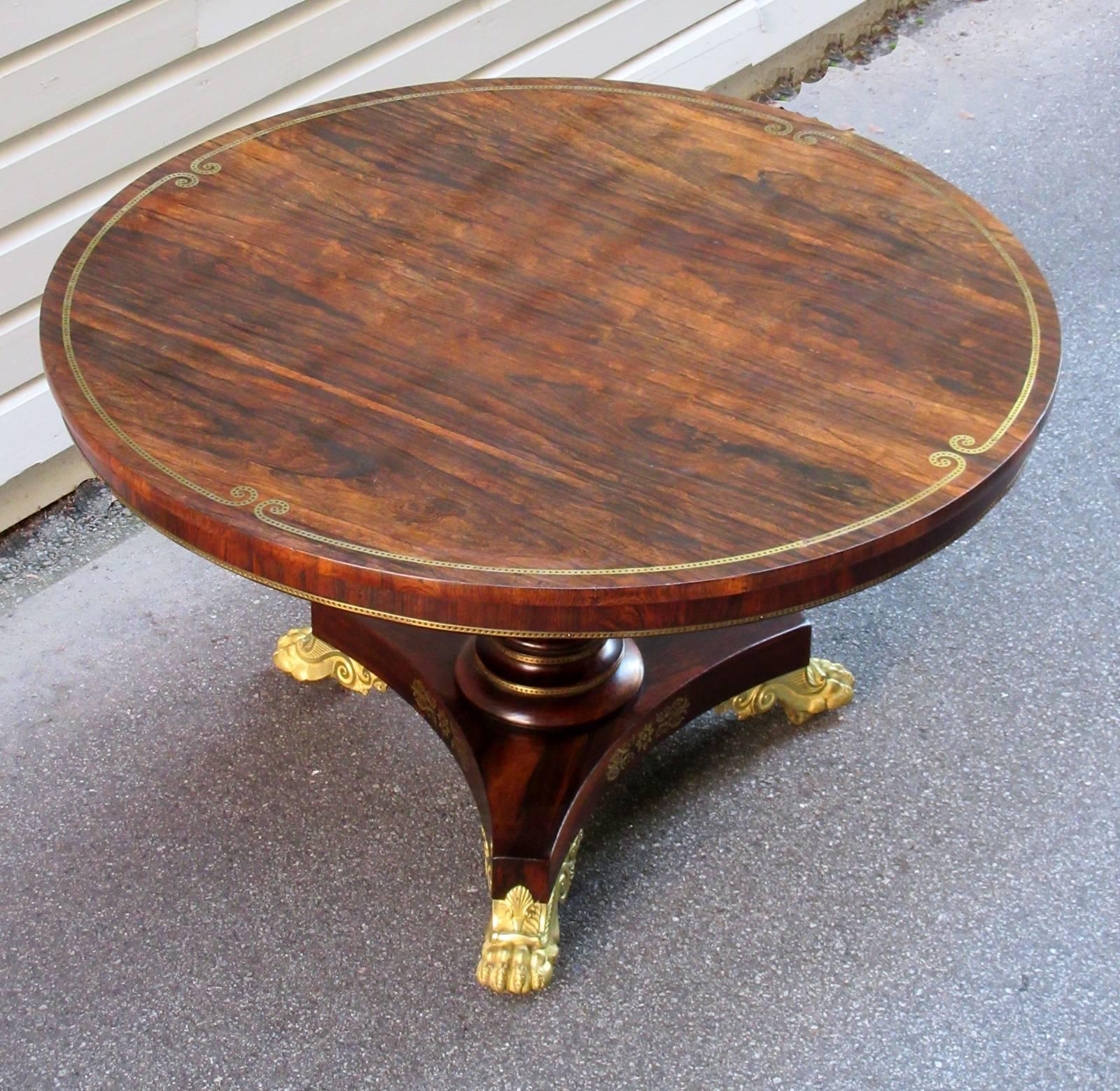 Brass 19th Century English Regency Rosewood Breakfast Table with Gilt Paw Feet For Sale