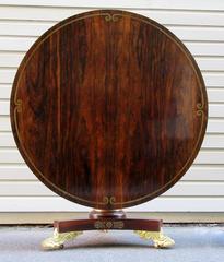 19th Century English Regency Rosewood Breakfast Table with Gilt Paw Feet