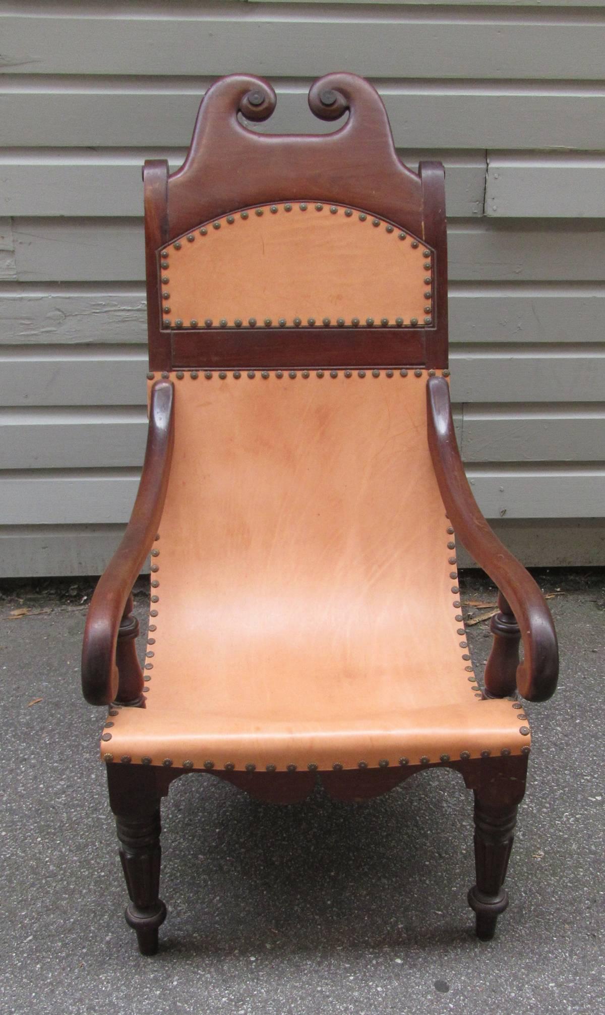 This elegant British Colonial 1810-1830 Campeche chair is made of solid mahogany and was known in Jamaica as a Spanish chair in the period. This West Indies Planter chair is one of the finest examples of this Regency Form made in the Caribbean. The