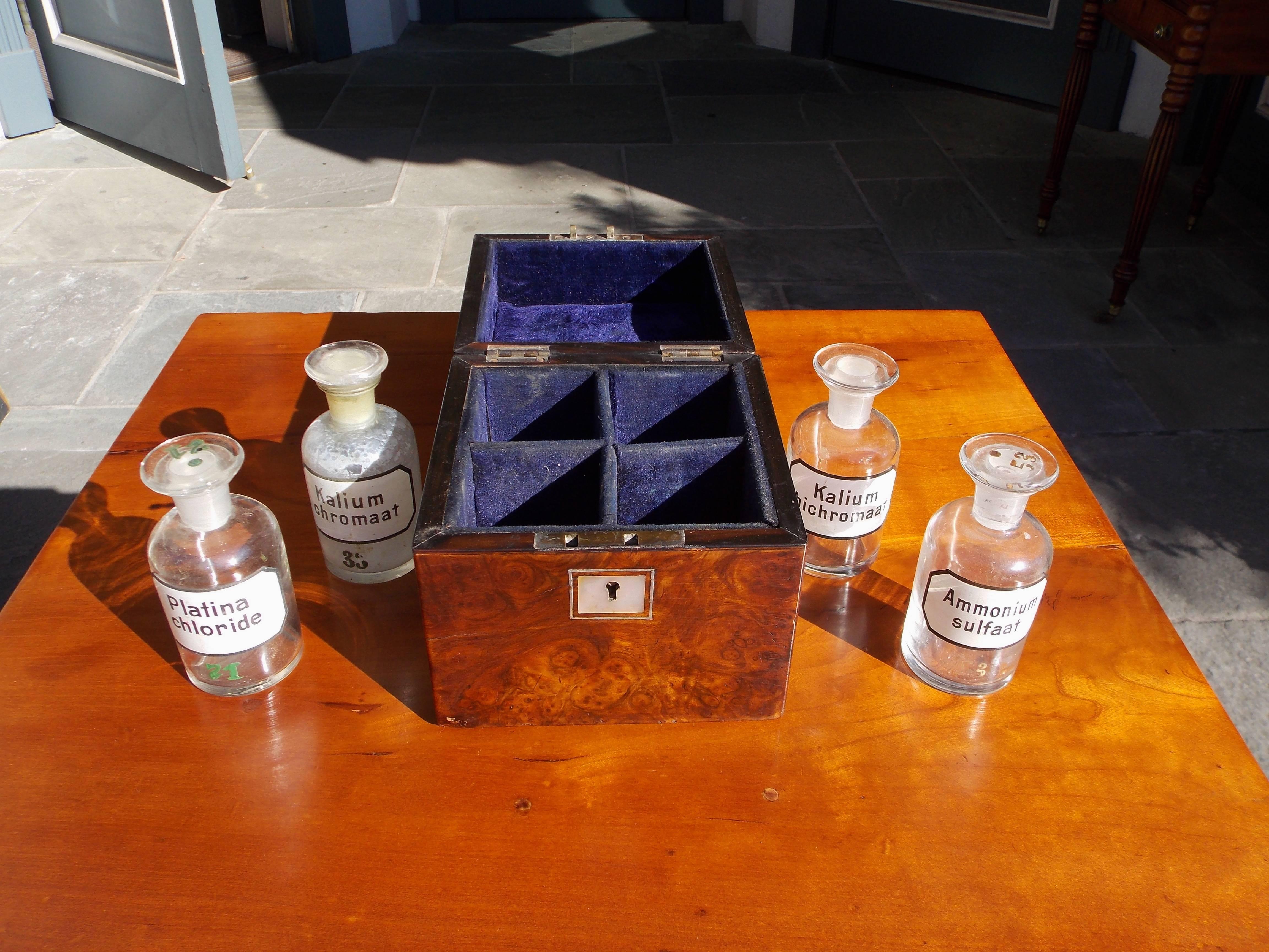 English Regency burl walnut medical box with mother of pearl inlay, hinged top, compartmentalized lined interior with the original glass bottles and stoppers.  Early 19th Century.  