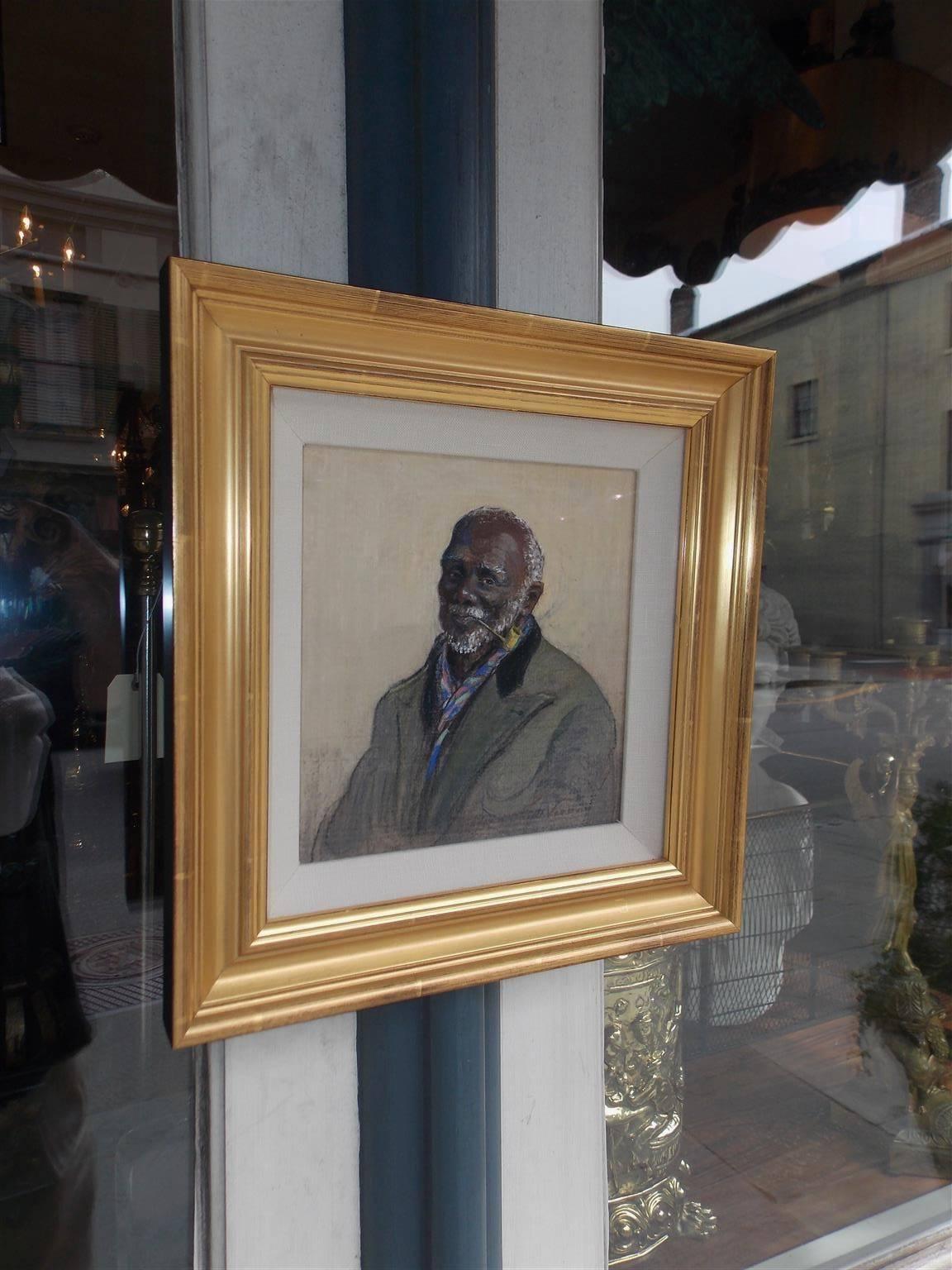 Elizabeth O'Neil Verner pastel on silk of Negro man with a black collar shirt and corn cob pipe under glass in gilt frame. Signed in lower right corner, early 20th century, American, 20th century.

 