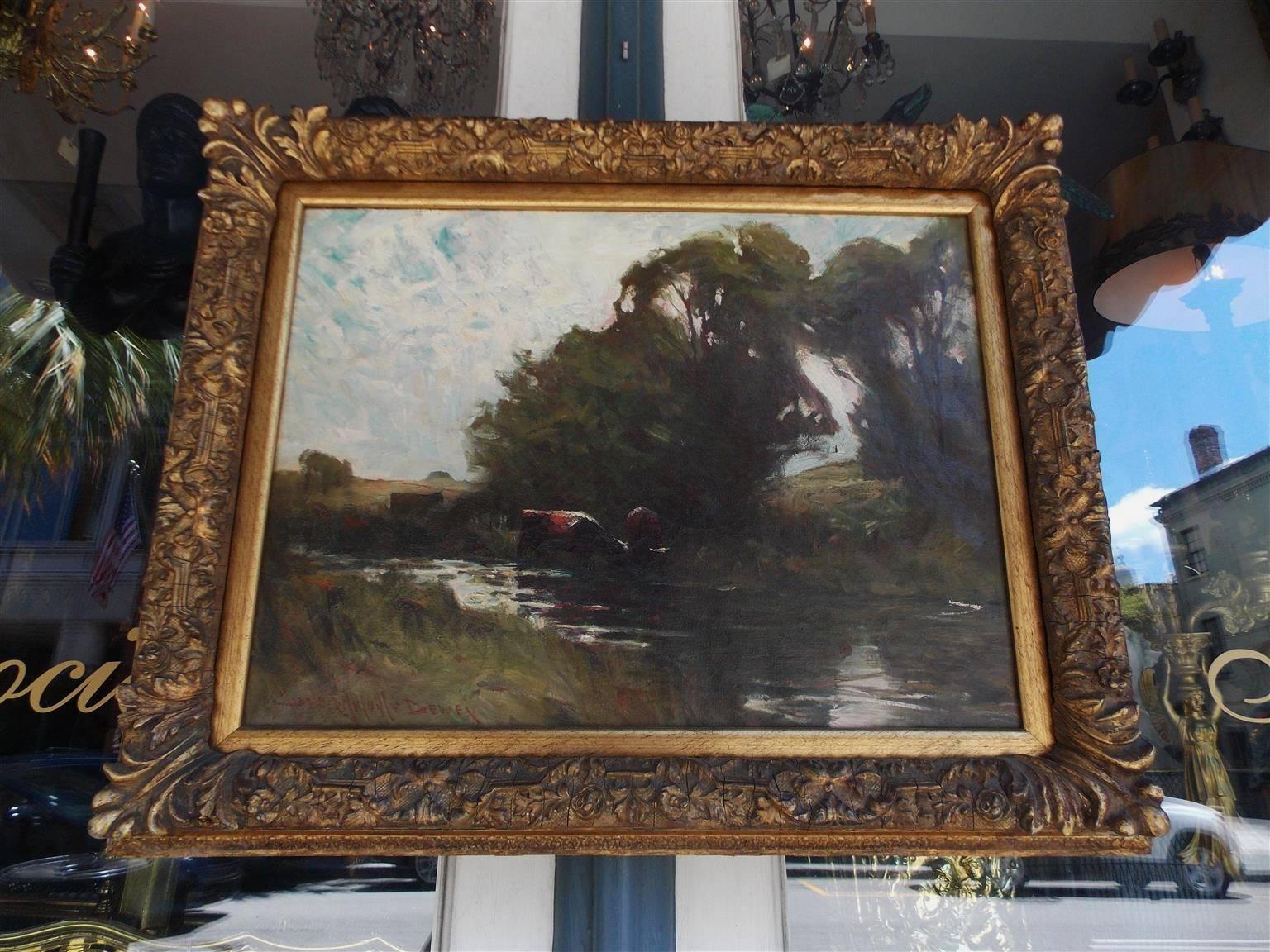 American oil on canvas landscape depicting cows grazing at stream in the original gilt floral frame. Signed lower left corner, Charles Melville Dewey, Late 19th Century.

Charles Melville Dewey was an American tonalist painter. He was born in