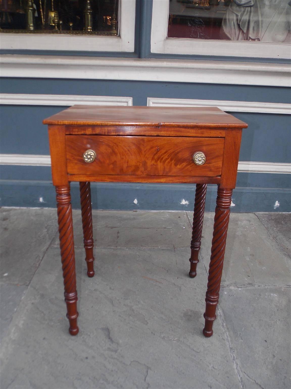 American mahogany one drawer side table with decorative pinwheel brass knobs, one board top, and terminating on turned bulbous ringed barley twist legs. Early 19th century. Secondary wood consist of white pine, poplar, and is finished on all sides.