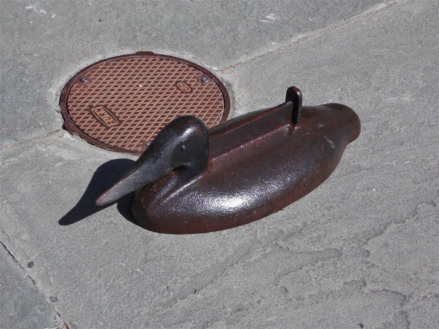 American cast iron duck boot scraper, Early 20th century.