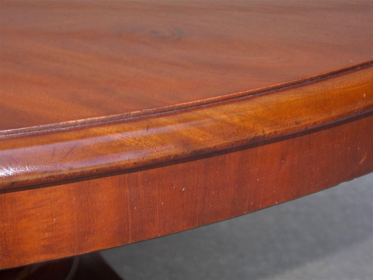 Early 19th Century English Regency Mahogany Tilt-Top Center Table with Paw Feet, Circa 1815 For Sale