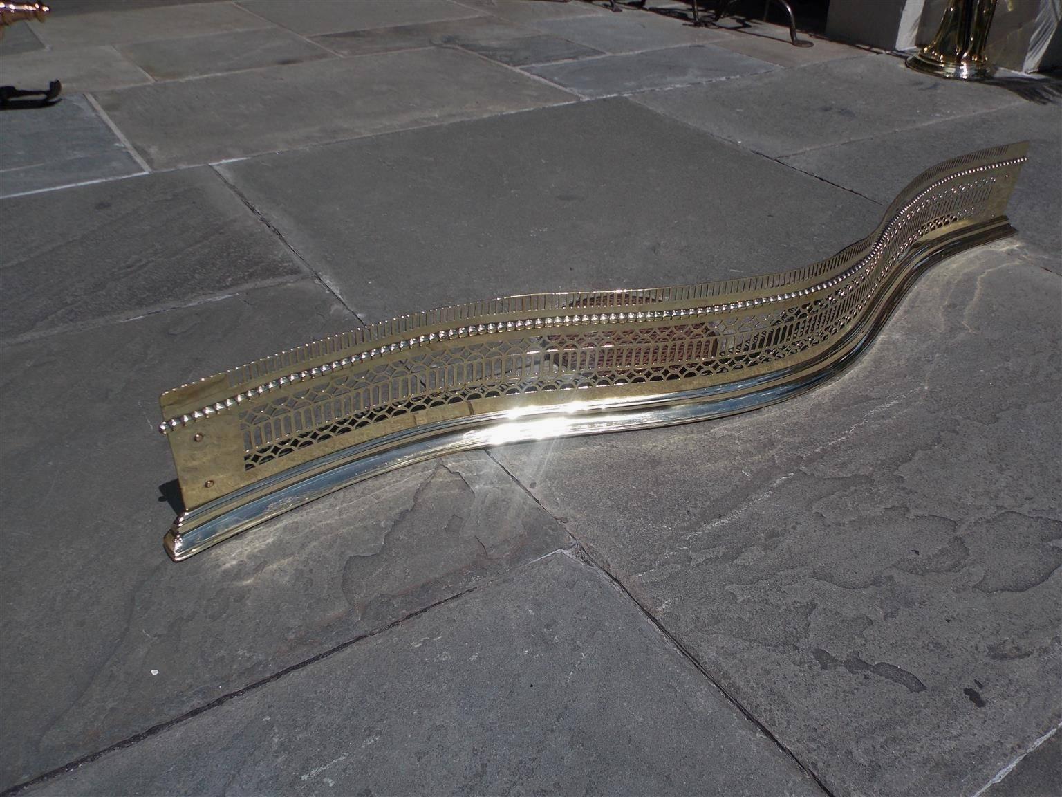 George III Elegant English Brass Serpentine Pierced Gallery Fireplace Fender, Circa 1780 For Sale