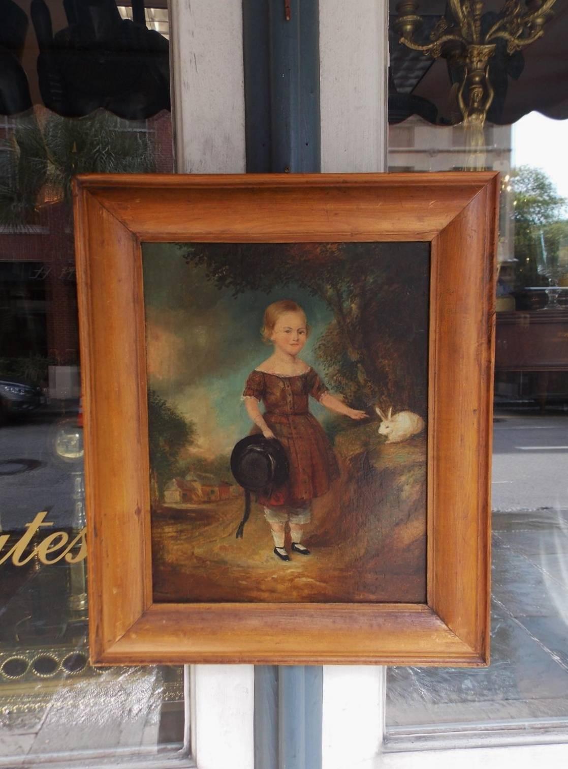 Paesaggio americano a olio su tavola con giovane donna in piedi accanto a un coniglio in primo piano, con cornice originale in pino modellato e supporto in legno. Inizio del XIX secolo.