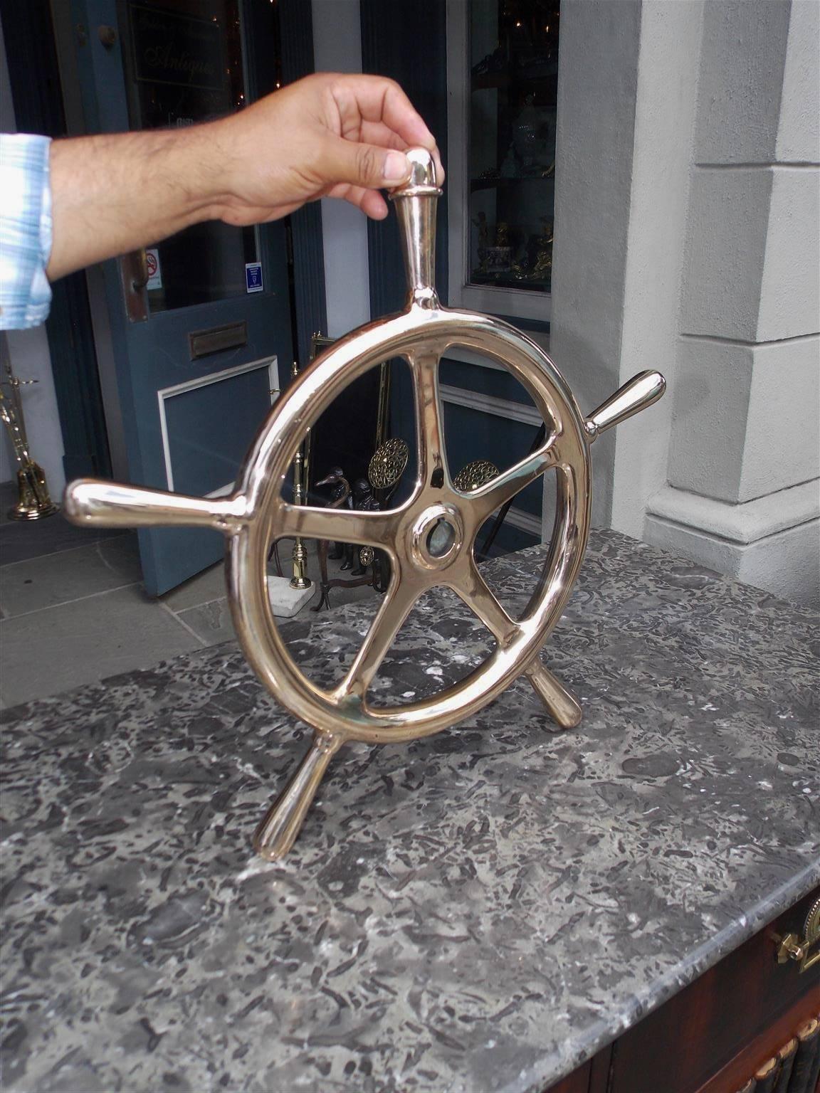 American solid brass five spoke ringed yacht wheel with original brass hub, Late 19th century.