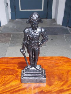 American Cast Iron Napoleon Doorstop Standing on a Step Back Plinth, Circa 1870