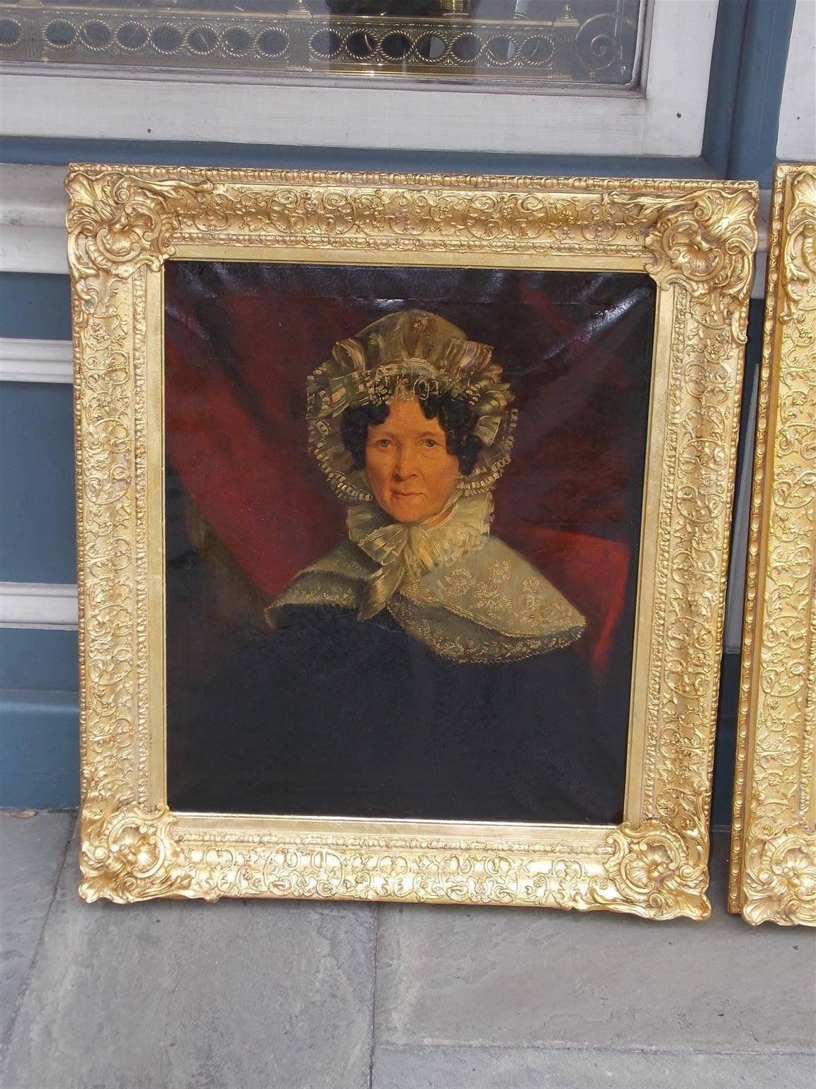 Pair of American oil on canvas portraits in the original floral gilt frames and stretchers. South Carolina, Late 18th century. Signed Dr. Anthony Hemingway on re-verso.