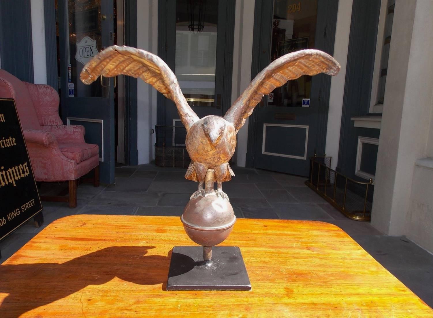 American diminutive gilt copper spread eagle weathervane mounted on squared iron stand, Early 19th century. Squared iron base is 4.75 inches . 