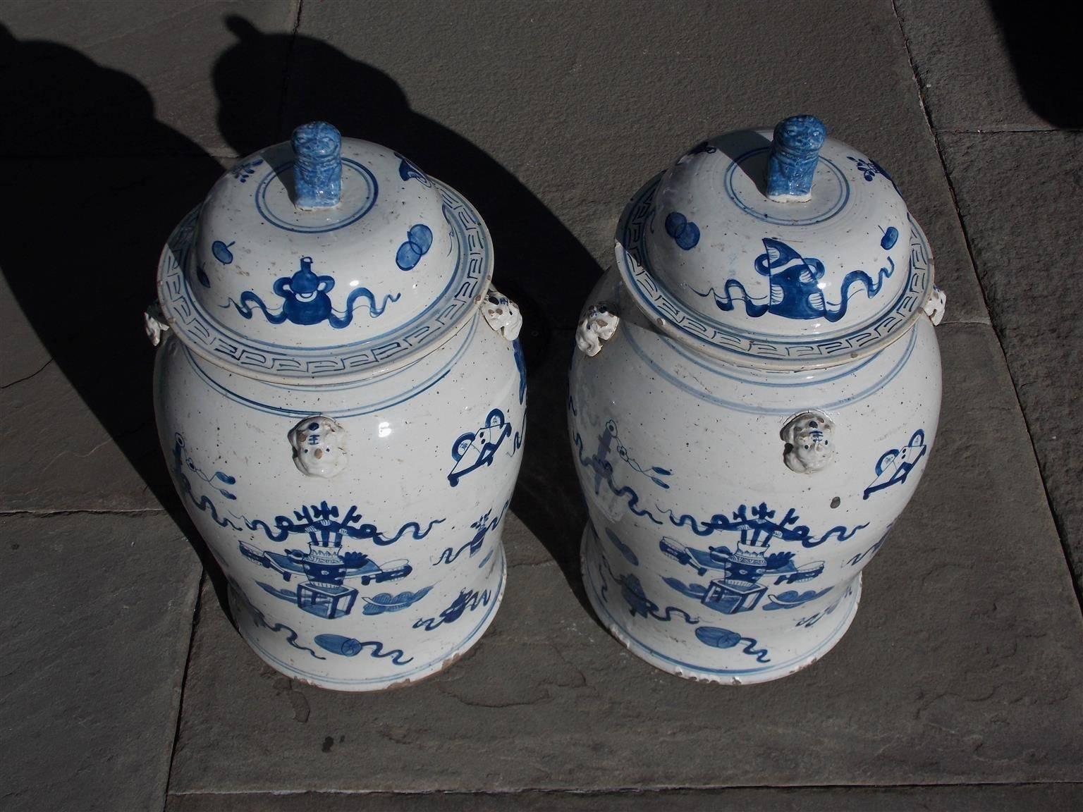 Chinese Export Pair of Chinese Porcelain Glazed Blue and White Foo Dog Temple Jars, 20th Cent. 